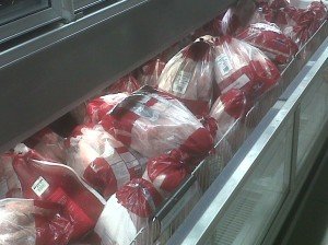 There must have been over 80 dressed turkeys in the frozen goods section of this supermarket. Being January, most of them will be thrown away. They will truly have died for nothing. Photo © Karen Johnson - The Elated Vegan