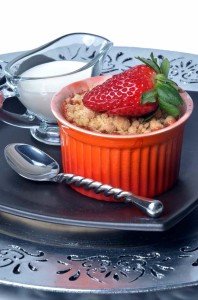 Vegan Strawberry and Citrus Crumble is perfect for a summer's afternoon with a china cup of berry infusion. Photo © Jade 'The Wild Bulb'.